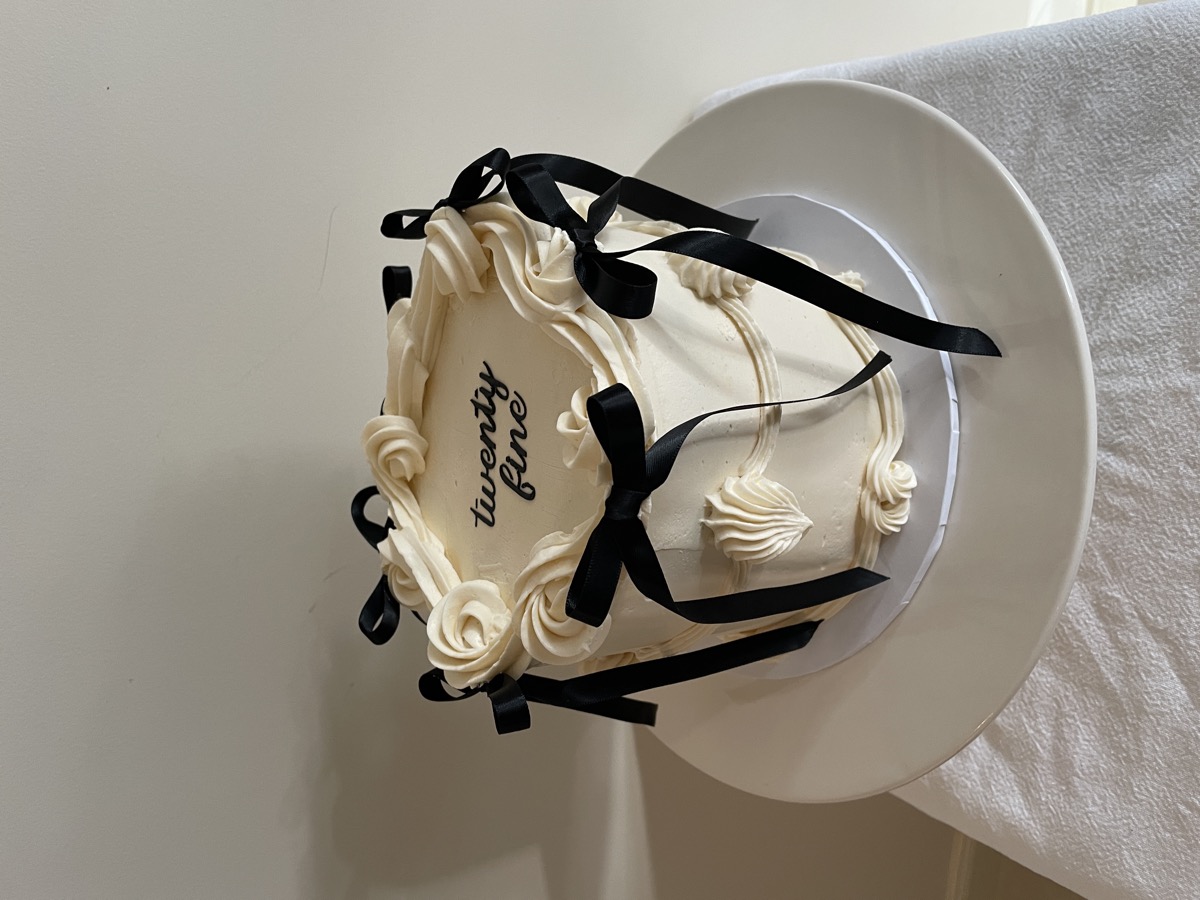 Twenty-five birthday cake with black ribbon bows