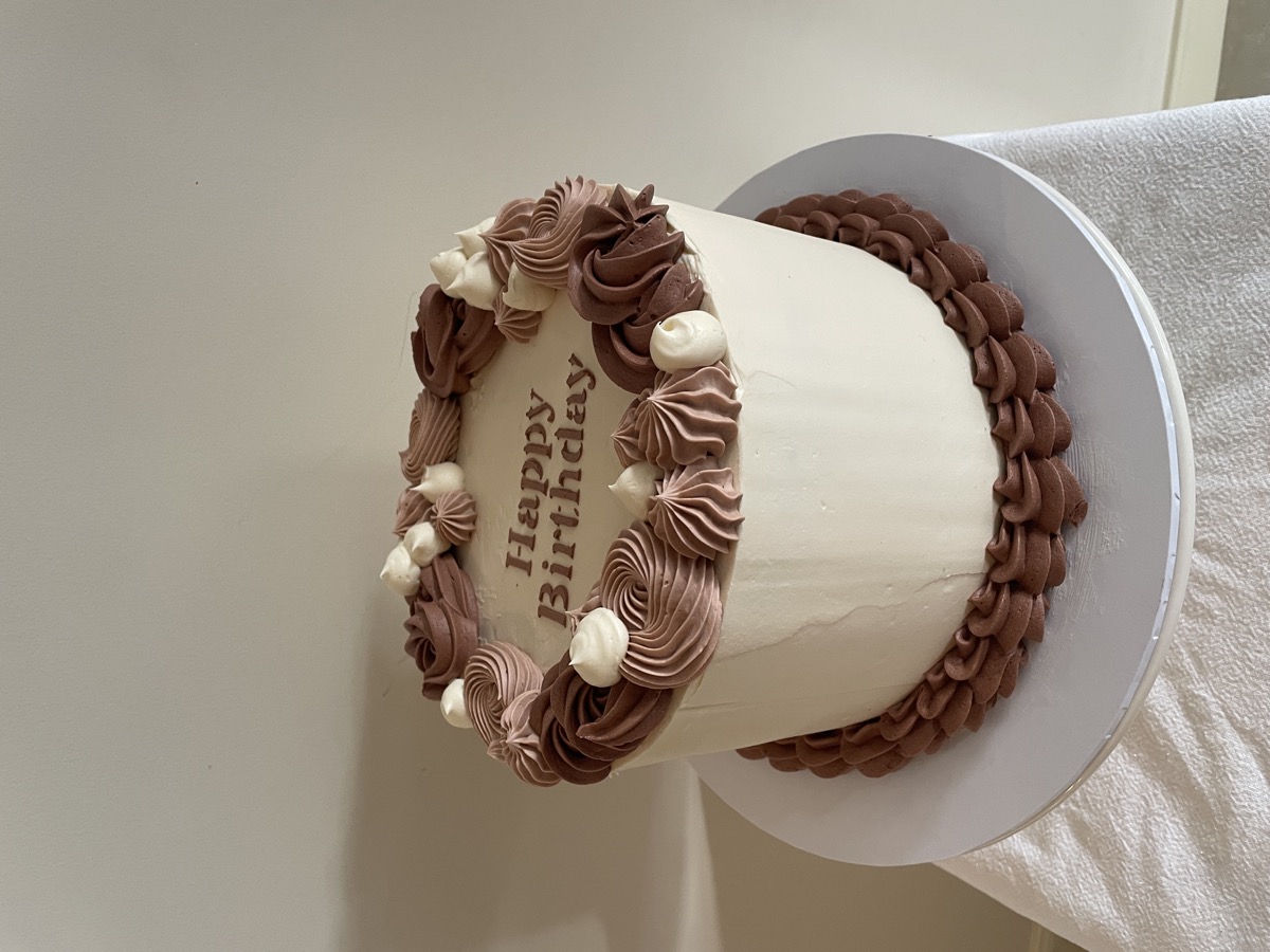 Chocolate and cream two-tone birthday cake