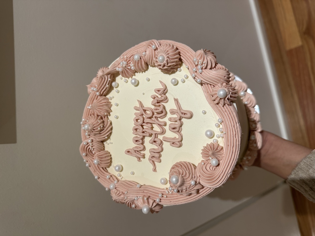 Happy Mothers Day cake with pink buttercream and pearls